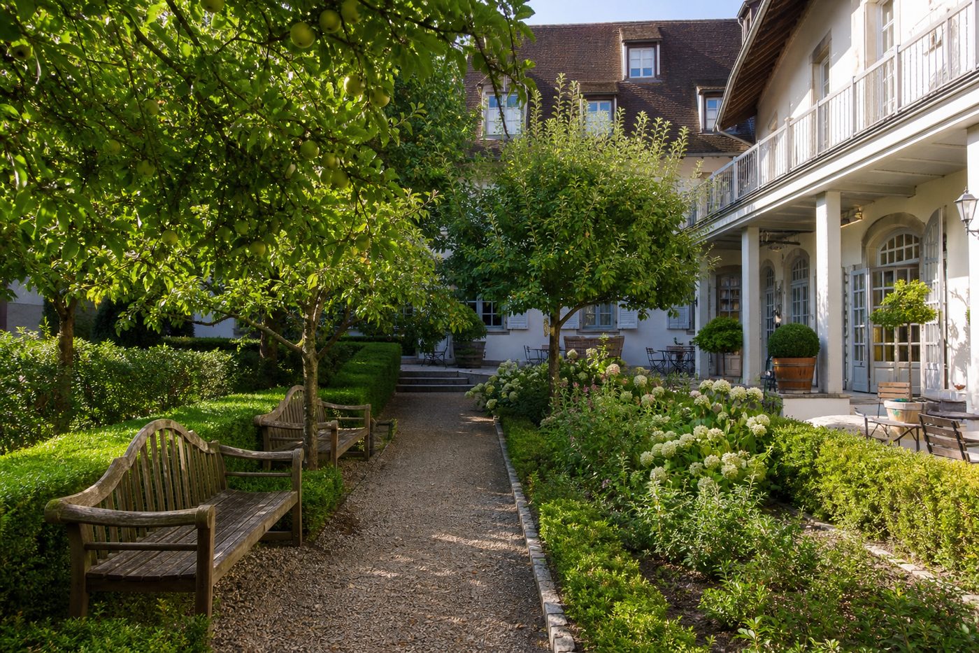 Hotel garden courtyard at Spine Marco Homes